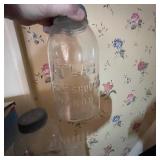 Plastic Storage Tower with Baskets, il Passatutto Velox Food Mill, and 2 Atlas Mason Jars