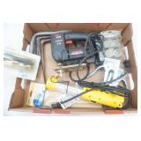 Hand Tools and Hardware: skil saw, halogen light, staplers