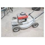 Craftsman gas-powered, self-propelled walk-behind lawn mower.