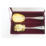 American Silversmiths Collection by Godinger USA. Silver-plated Berry Serving Spoons with a gold wash.