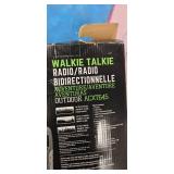 lot features brand-new Cobra walkie-talkie radios with up to 32-mile range