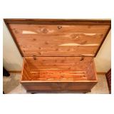 Antique Wooden Cedar Storage Chest - Lift-Top, Carved Front, Bun Feet