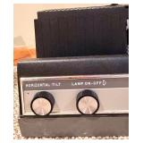 Ward 644 Automatic Slide Projector - Coated Anastigmat 4-Inch Lens and Radiant Deluxe Meteor Tripod Projection Screen