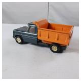 Vintage Structo Kom-Pak pressed steel toy dump truck.