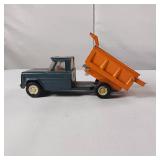 Vintage Structo Kom-Pak pressed steel toy dump truck.