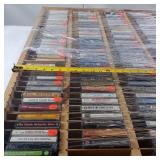 36 x 32 inches Large Lot of Cassette Tapes in Wooden Display Case