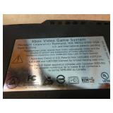 XBox with Controllers and Games