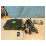 XBox with Controllers and Games