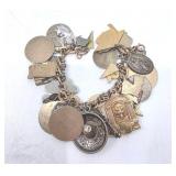 Mixed Metal Charm Bracelet including 10K, 12K and 925 - 111.2 grams