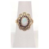 Beautiful Opal and Garnet Ring Set in 10K Yellow Gold - Size 6.75