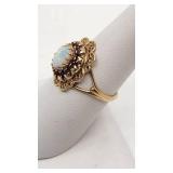 Beautiful Opal and Garnet Ring Set in 10K Yellow Gold - Size 6.75