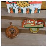Adler Brau lot with Brand New Reusable Box, ad sign and Take along an Adler 8 Pack sign.