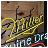 hummm hummmm... This Neon Light works!  Miller Genuine Draft Light about 30 inches wide by 24 inches