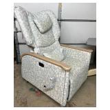 Hospital Patient Mobile Recliner Chair with Flip-Up Tray Table. Fully reclining medical chair converts to near-flat position *Padded arms, headrest, manual footrest, side tray table, and casters. Idea