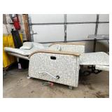 Hospital Patient Mobile Recliner Chair with Flip-Up Tray Table. Fully reclining medical chair converts to near-flat position *Padded arms, headrest, manual footrest, side tray table, and casters. Idea