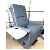 MSRP $8000 Champion mobile power patient recliner features electric recline, integrated seat heating, swing-out armrests for easier entry/exit, a flip-up tray table & hospital-grade designed for l