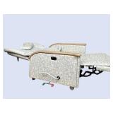 Hospital Patient Mobile Recliner Chair with Flip-Up Tray Table. Fully reclining medical chair converts to near-flat position *Padded arms, headrest, manual footrest, side tray table, and casters. Idea