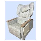 Hospital Patient Mobile Recliner Chair with Flip-Up Tray Table. Fully reclining medical chair converts to near-flat position *Padded arms, headrest, manual footrest, side tray table, and casters. Idea