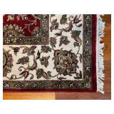 Large Area Rug with Red Floral Pattern