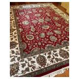 Large Area Rug with Red Floral Pattern