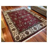 Large Area Rug with Red Floral Pattern