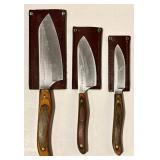 K - Set of 3 Vintage New West KnifeWorks Knives with Leather Sheaths