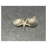 Collection of Nautical Brooches, Shell Clip, and Dolphin Necklace