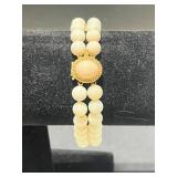 Vintage Jewelry Set: Coral Red Necklace, Double-Strand Bead Bracelet, and Brooch