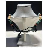 Collection of Vintage Coral Jewelry Including Necklaces, Rings, and Brooches