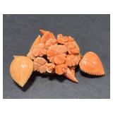 Collection of Vintage Coral Jewelry Including Necklaces, Rings, and Brooches