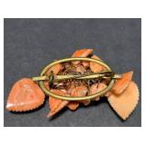 Collection of Vintage Coral Jewelry Including Necklaces, Rings, and Brooches