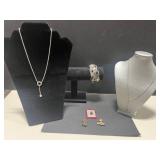 Collection of Sterling Silver Jewelry Including Dolphin Necklace, Anchor Pendants, and Cuff Bracelet