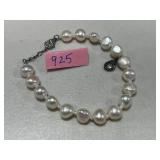 Collection of Sterling Silver Jewelry: Pearl Necklaces, Starfish Bracelet, and Owl Brooch