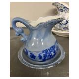 Set of Assorted Vintage Miniature Porcelain Pitchers with Saucers