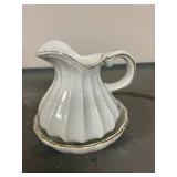 Set of Assorted Vintage Miniature Porcelain Pitchers with Saucers