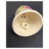 Collection of Decorative Glass, Porcelain, and Brass Bells with Crystal Dishes