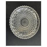 Collection of Decorative Glass, Porcelain, and Brass Bells with Crystal Dishes