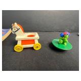 Mixed Lot: Vintage Mug, Ceramic Dog Planter, Books, and Toys