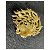 Collection of Costume Brooches Including Cat, Lion, Bird, Sailboat, Nautical Wheel, and Abstract Designs