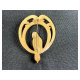 Collection of Costume Brooches Including Cat, Lion, Bird, Sailboat, Nautical Wheel, and Abstract Designs