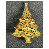 Collection of Vintage Costume Jewelry Brooches Including Trifari, Avon, and Ralph Massey