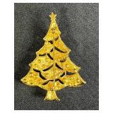 Collection of Vintage Costume Jewelry Brooches Including Trifari, Avon, and Ralph Massey