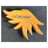 Collection of Vintage Costume Jewelry Brooches Including Trifari, Avon, and Ralph Massey