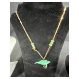 Set of Gold Tone Jewelry Pieces with Whale Pendant Necklace and Faux Pearls