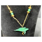 Set of Gold Tone Jewelry Pieces with Whale Pendant Necklace and Faux Pearls