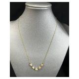 Set of Gold Tone Jewelry Pieces with Whale Pendant Necklace and Faux Pearls