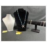 Jewelry Collection with Beaded Necklaces, Bracelets, and Gold-Tone Crocodile Pin