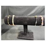 Jewelry Collection with Beaded Necklaces, Bracelets, and Gold-Tone Crocodile Pin