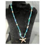 Jewelry Collection with Beaded Necklaces, Bracelets, and Gold-Tone Crocodile Pin