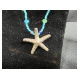 Jewelry Collection with Beaded Necklaces, Bracelets, and Gold-Tone Crocodile Pin